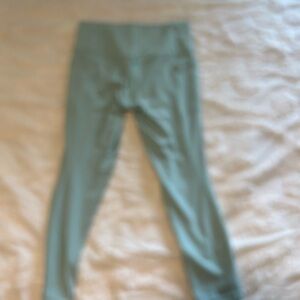 Athleta Salutation Stash Pocket II 7/8 Tight Leggings